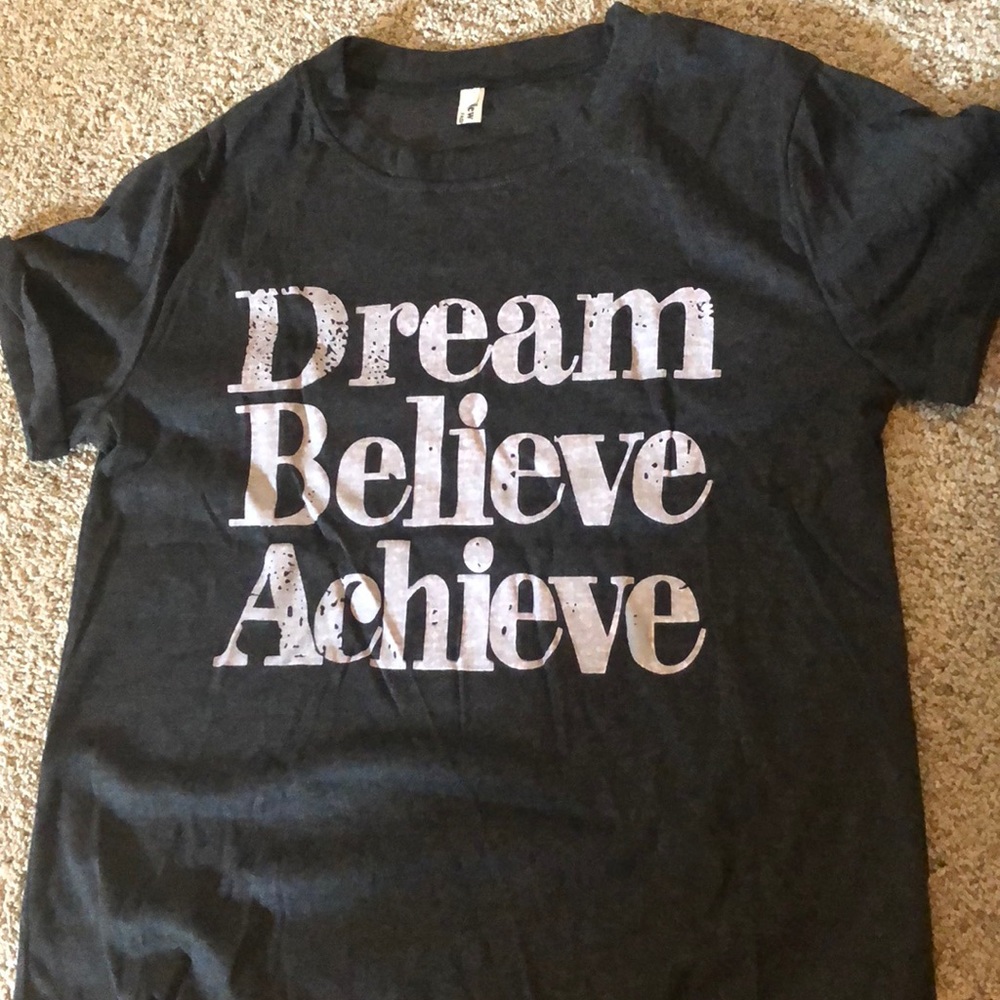 New in package “Dream Believe Achieve” t-shirt.